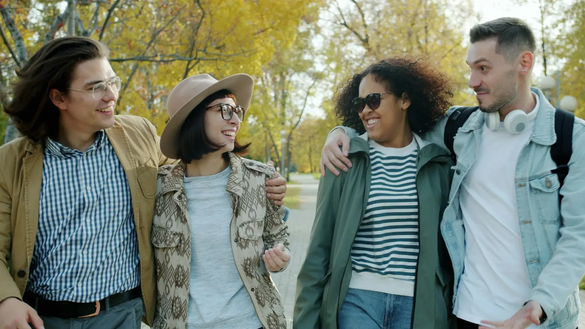Friends walking together in a park